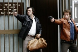 Jacques Mesrine (Vincent Cassel) und Franois Besse (Mathieu Amalric) in einer Schiesserei - Public Enemy No.1
